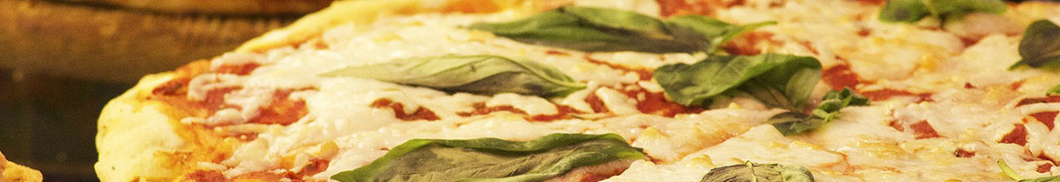 Eating Italian Pizza at Primo Pizzeria & Italian Specialties restaurant in Saratoga Springs, NY.